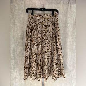 A mid-length flowy leopard skirt. This was purchased at Pink Lily size small.